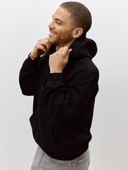 Men Black Relaxed Fit Hoodie – Comfortable Cotton Sweatshirt for Everyday Style in Pakistan | HARCHIZ