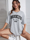 Women Printed Drop-Shoulder Sleeves Oversized T-Shirt – Stylish Cotton Wear Pakistan